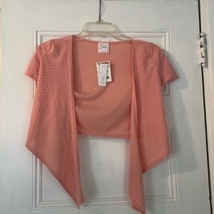 Pink wrap crop top, brand is Livi by Olivia Rae